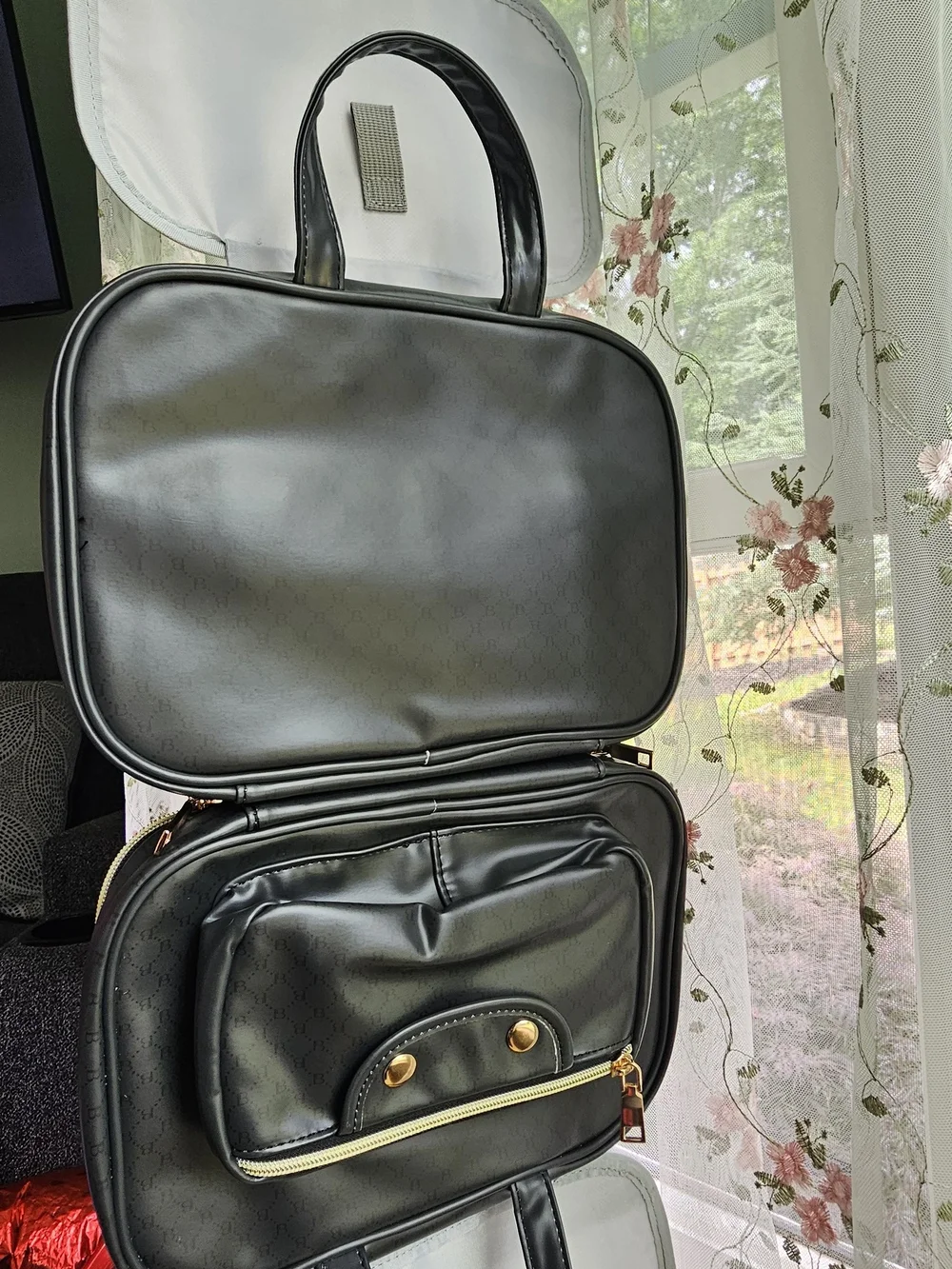 Black Womans Travel Make Up Bag with Gold Hardware